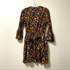 Floral dress with sleeves Size 8.